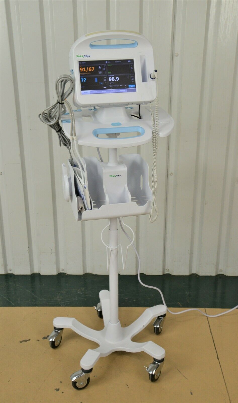 https://www.rhinotradellc.com/wp-content/uploads/imported/8/Welch-Allyn-6000-Series-Vital-Signs-Monitor-64NTXX-w-Rolling-Cart-234415599448.JPG